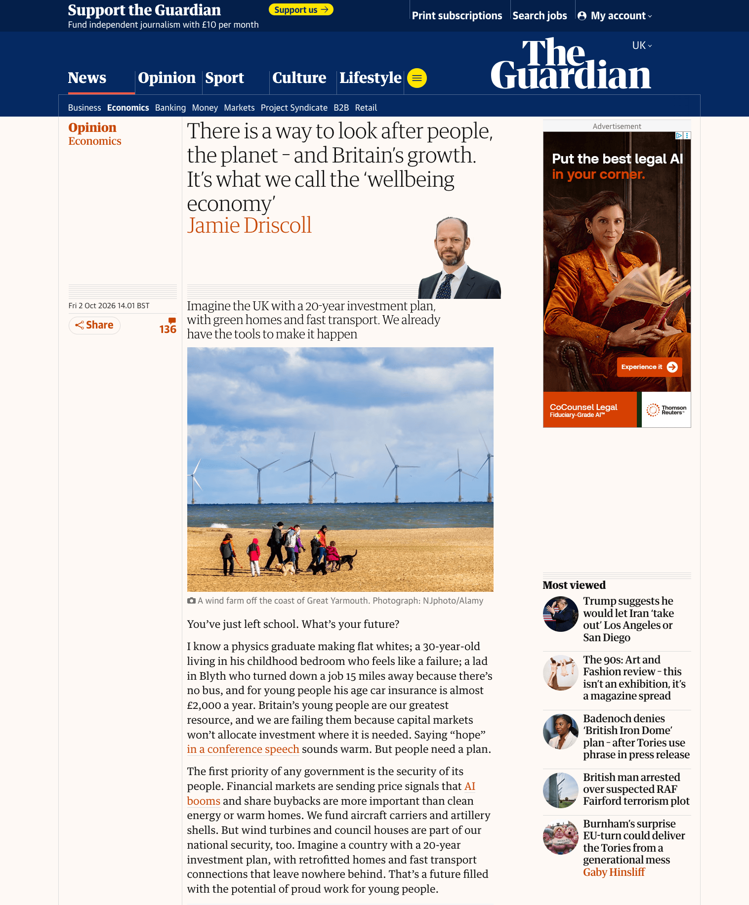 Screenshot of The Guardian's article on Hostage Nation. It has a head shot of Jamie Driscoll under the title and an image of wiind turbines at sea in the distance of a family walking alone a UK beach. The title of the article is There is a way to look after people, the planet – and Britain’s growth. It’s what we call the ‘wellbeing economy’