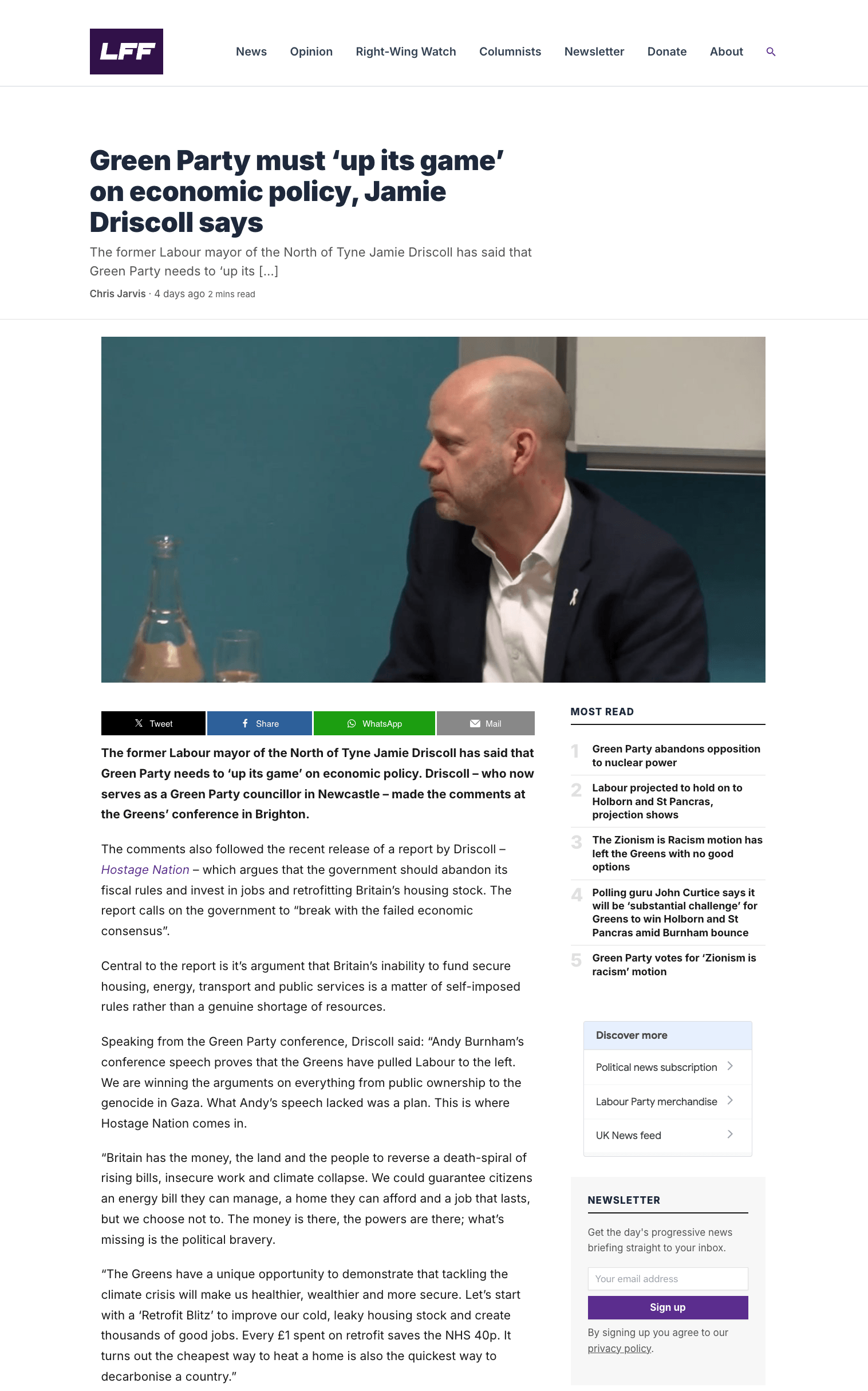 Screnshot of Left Foot Forward's artcile on Hostage Nation. It shows and image of Jamie Driscoll in conversation. The title of the article is Green Party must ‘up its game’ on economic policy, Jamie Driscoll says